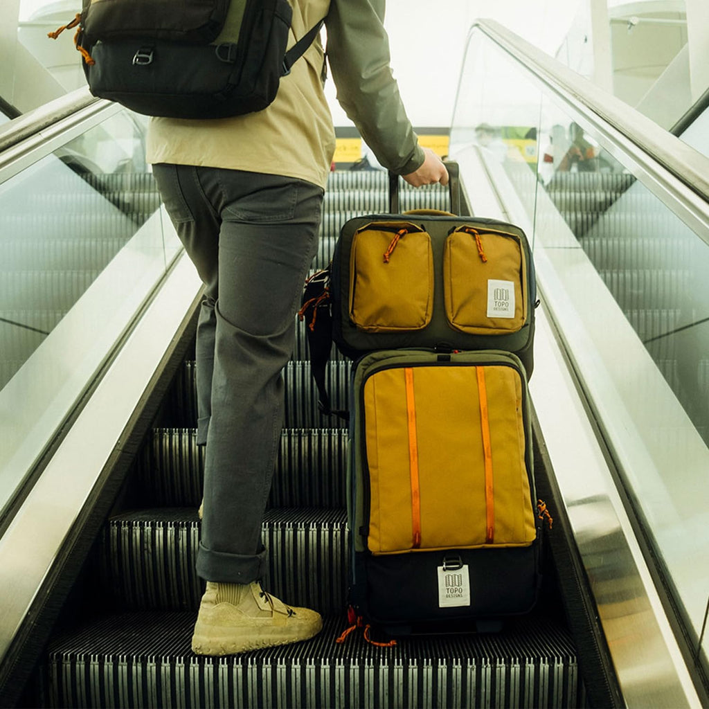 Topo Designs Global Travel Roller Bag Suitcase, Carry-On Friendly, 3 Carry Options, Smooth Heavy Duty Wheels, Telescoping Handle, Designed in Denver CO USA, PFAS Free (Dark Denim/Burgundy)