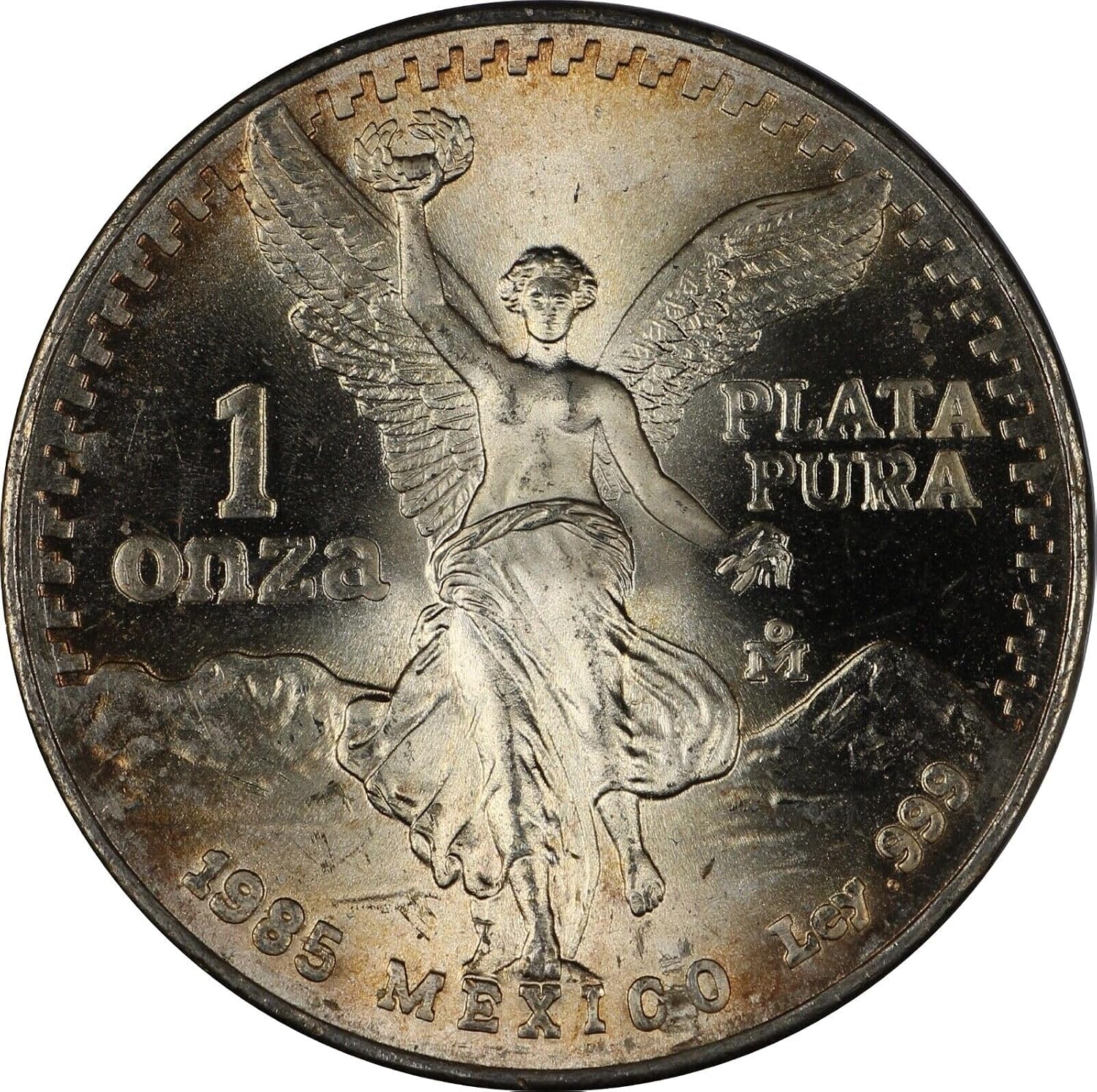 1982 - 1995 Mexico 1 Troy Oz .999 Fine Silver Libertad Silver Coin I Features the National Seal of Mexico 'Estados Unidos Mexicanos' Winged Victory Statue With Volcanoes Popocatépetl and Iztaccíhuatl I Monetized By Mexican Government
